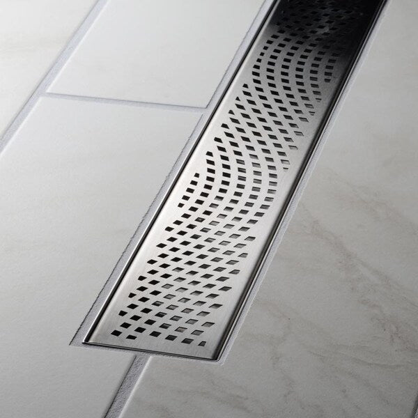 Designline⢠28 in. Stainless Steel Linear Shower Drain Wave Grate